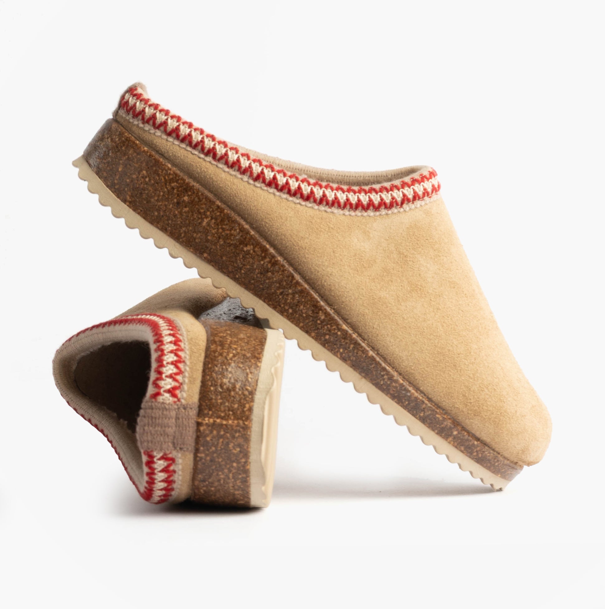 Nordikas 2247 Womens Suede Mule Slippers Beige side view showcasing premium suede material and decorative red stitching.