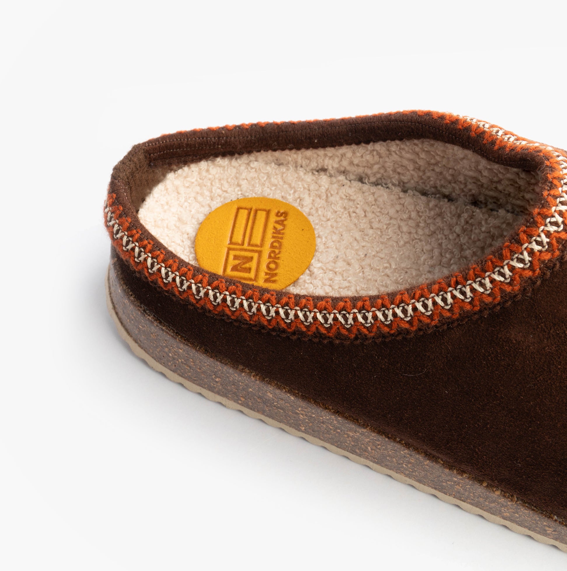 Nordikas 2258 Mens Suede Mule Slippers Brown side view showing suede upper and detail stitching.