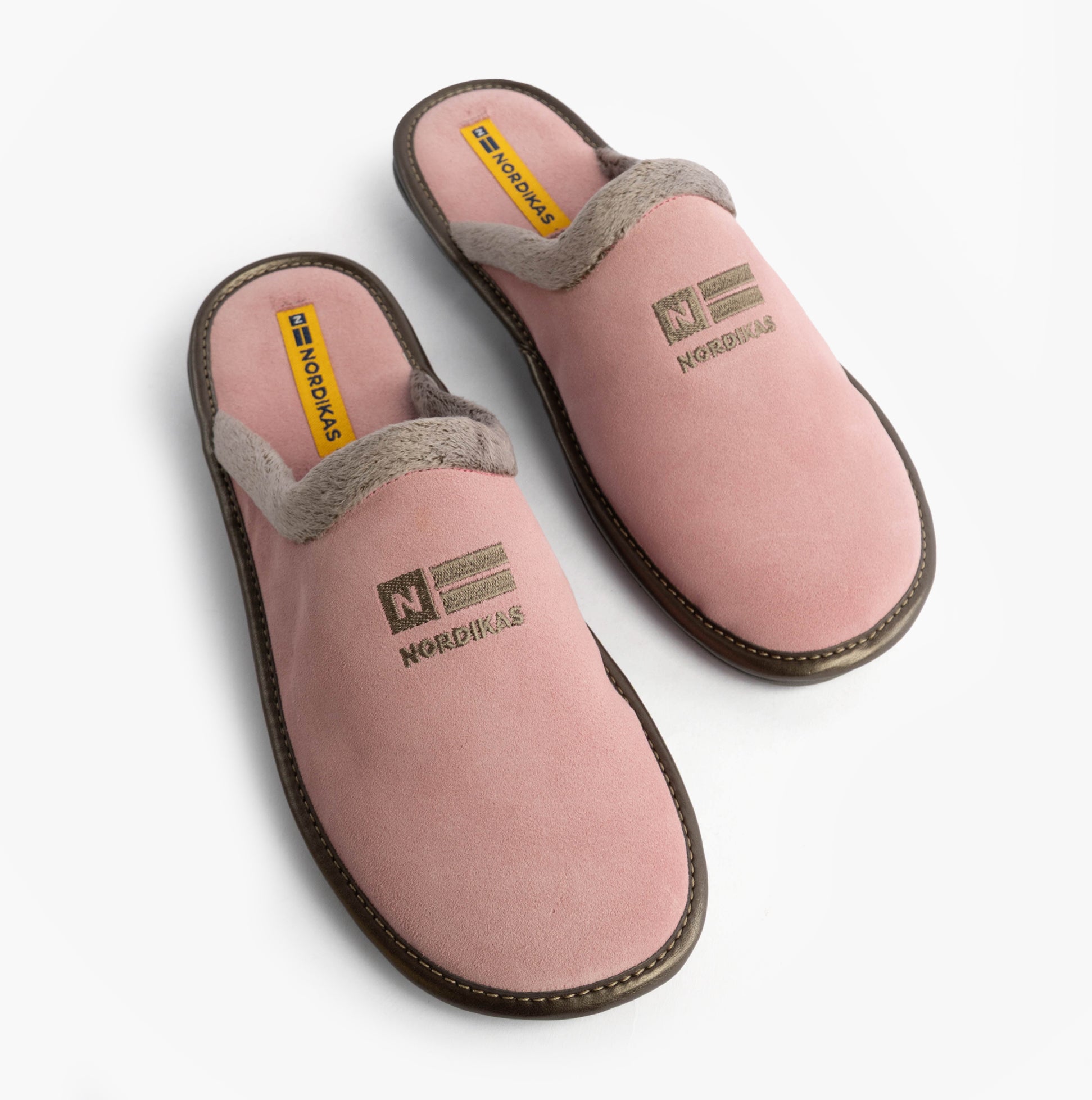 Nordikas 238 Womens Suede Mule Slippers Rose Pink side view showcasing soft suede and faux fur lining.