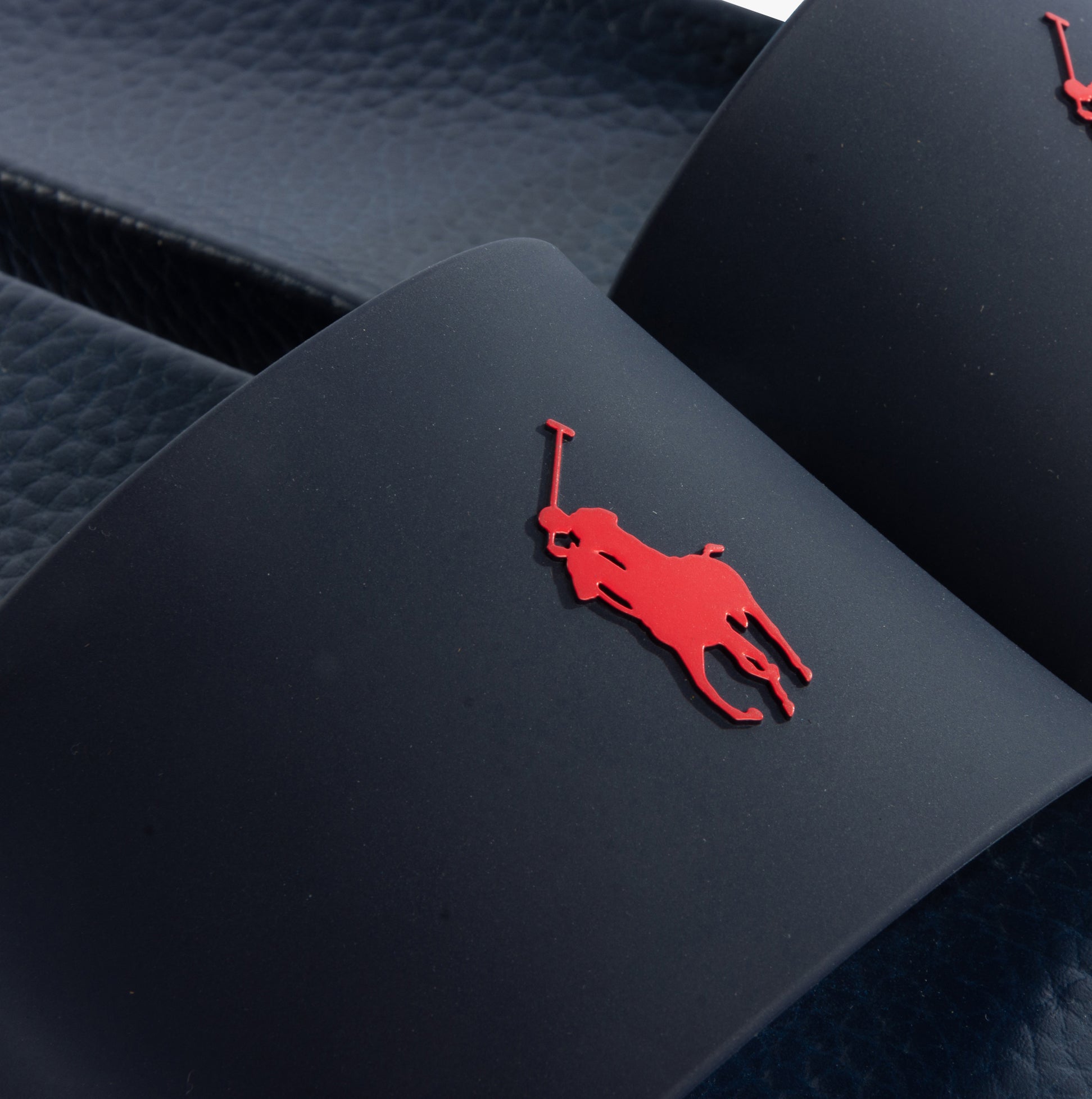 Polo Ralph Lauren POLO SLIDE Mens Sandals Navy/Red detailed view with red logo on navy upper.