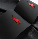 Polo Ralph Lauren POLO SLIDE Mens Sliders Black/Red detail view showcasing red logo on black slide.