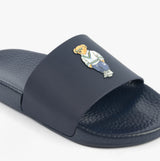 Polo Ralph Lauren POLO SLIDE Mens Sliders Heritage Bear Navy detail view featuring iconic bear design on a navy slide.