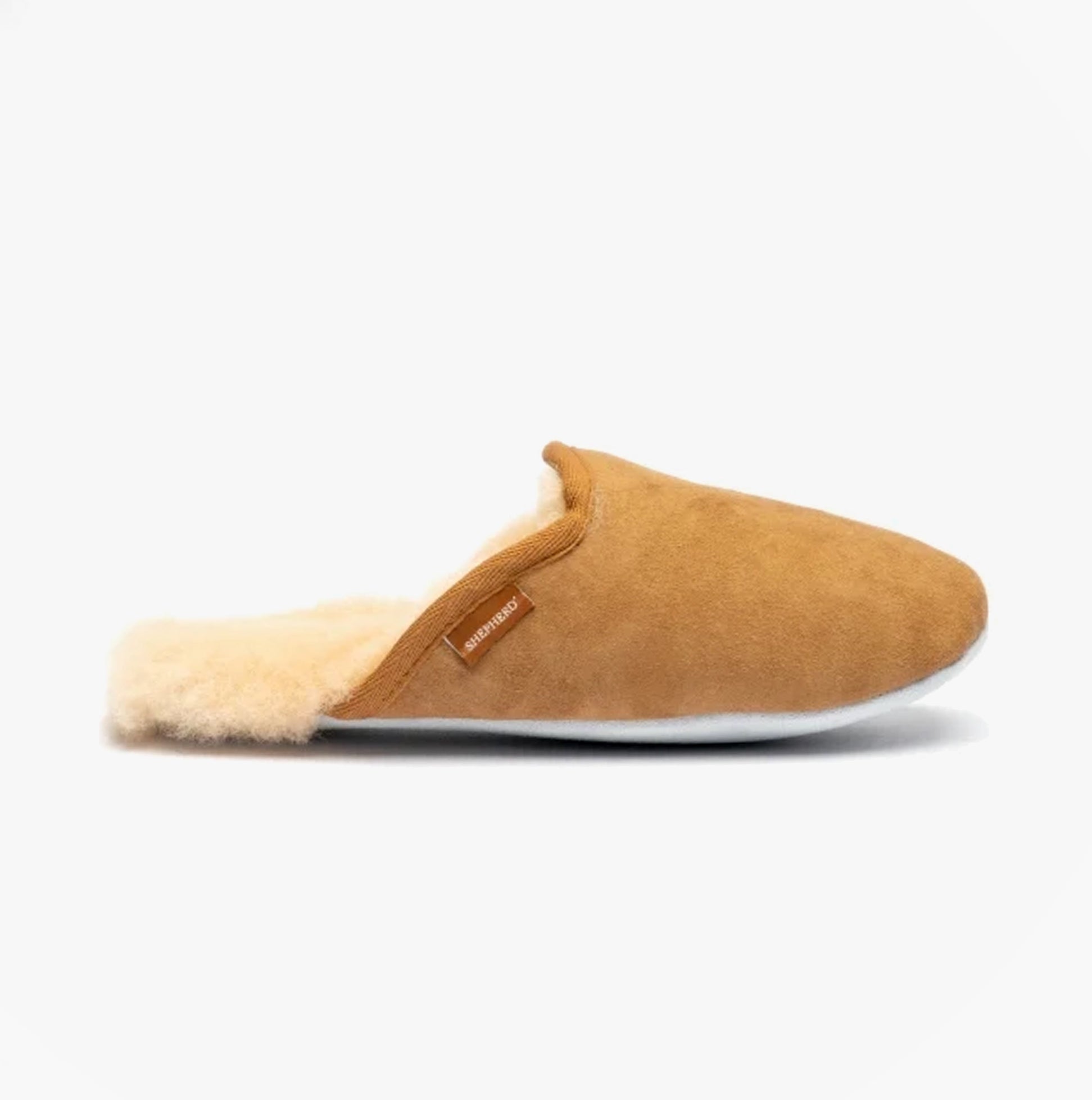 Shepherd CLEO Womens Sheepskin Mules Chestnut side view showing soft suede upper and warm lining.