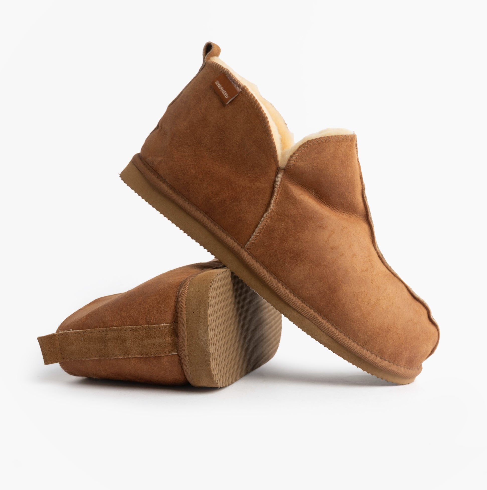 Shepherd ANTON Mens Sheepskin Slipper Boots Brown side view showing soft sheepskin material and flat EVA sole.