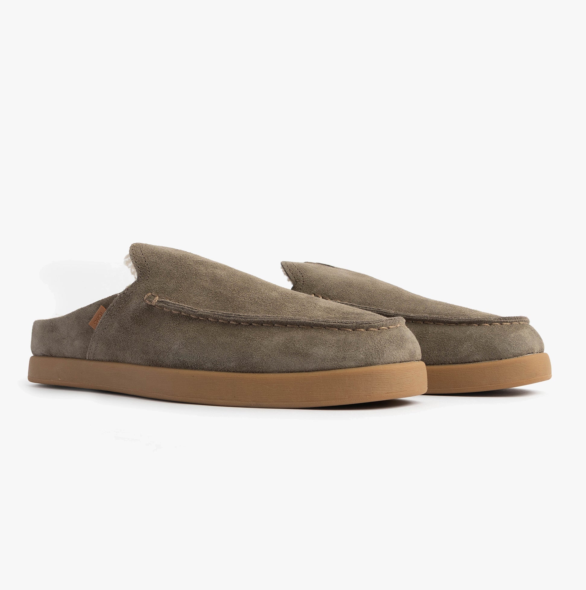 TOMS ALONSO MULE Mens Faux Shearling Lined Slippers Olive side view showing suede material and slip-on design.