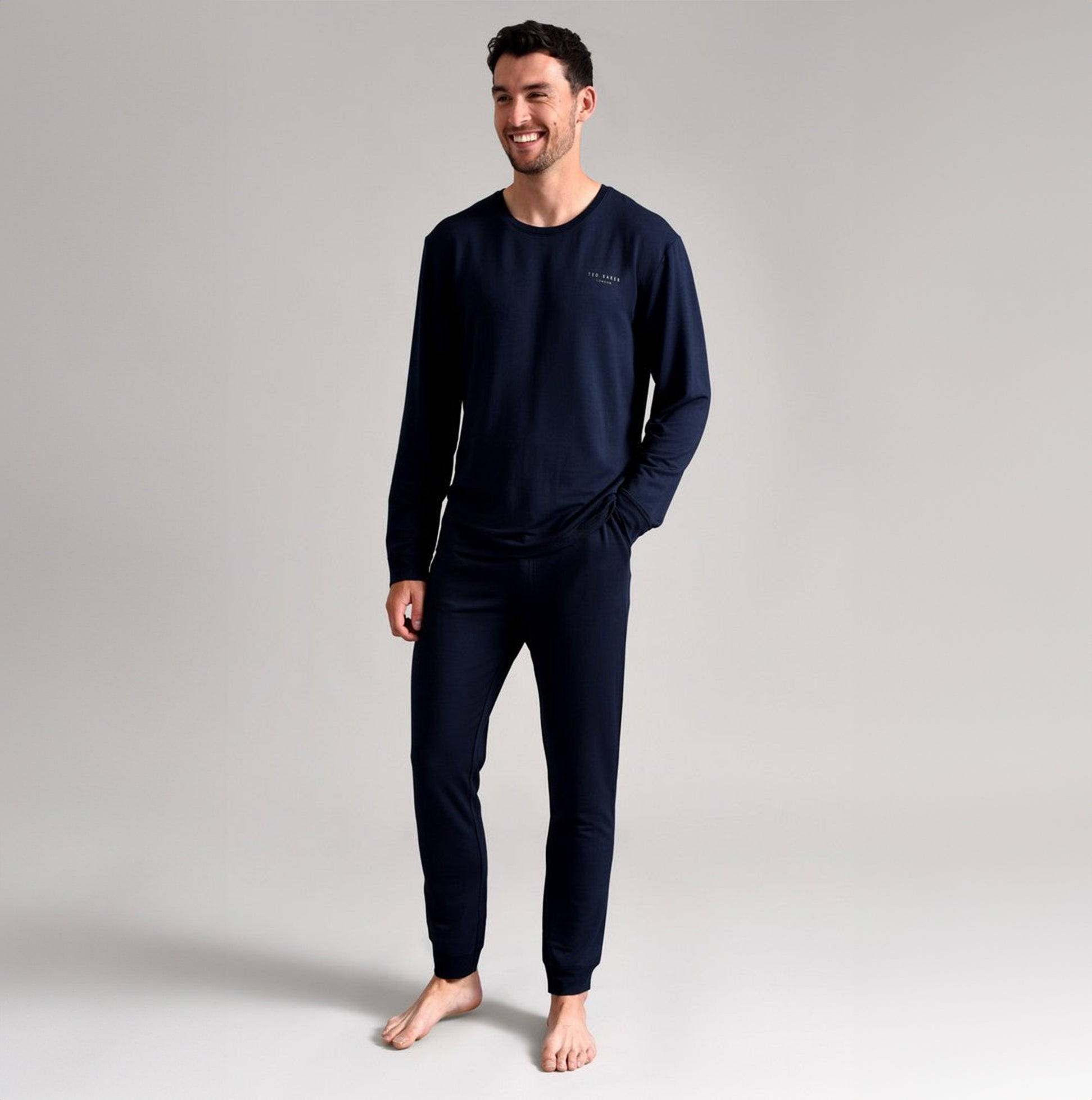 Ted Baker SUPER SOFT Joggers Mens Navy front view, model wearing matching navy top and joggers, comfortable fabric.