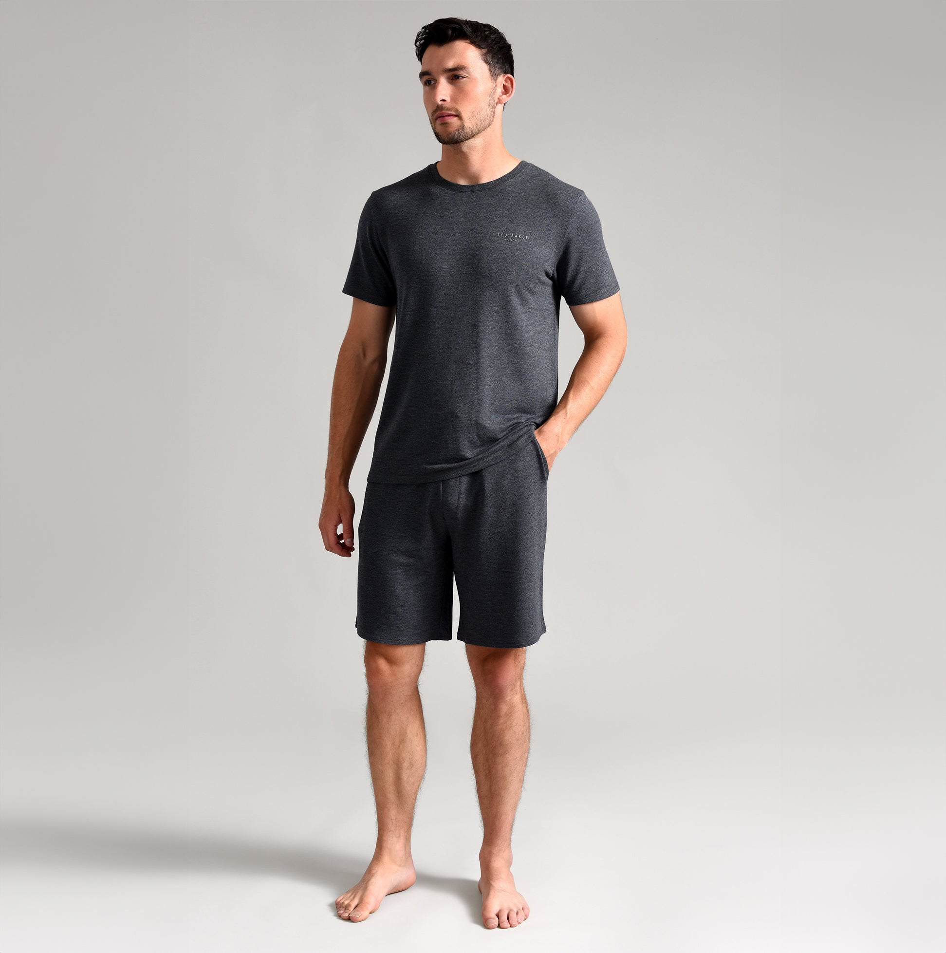 Ted Baker SUPER SOFT Shorts Mens Dark Grey front view with model standing casually, showcasing comfort and fit.