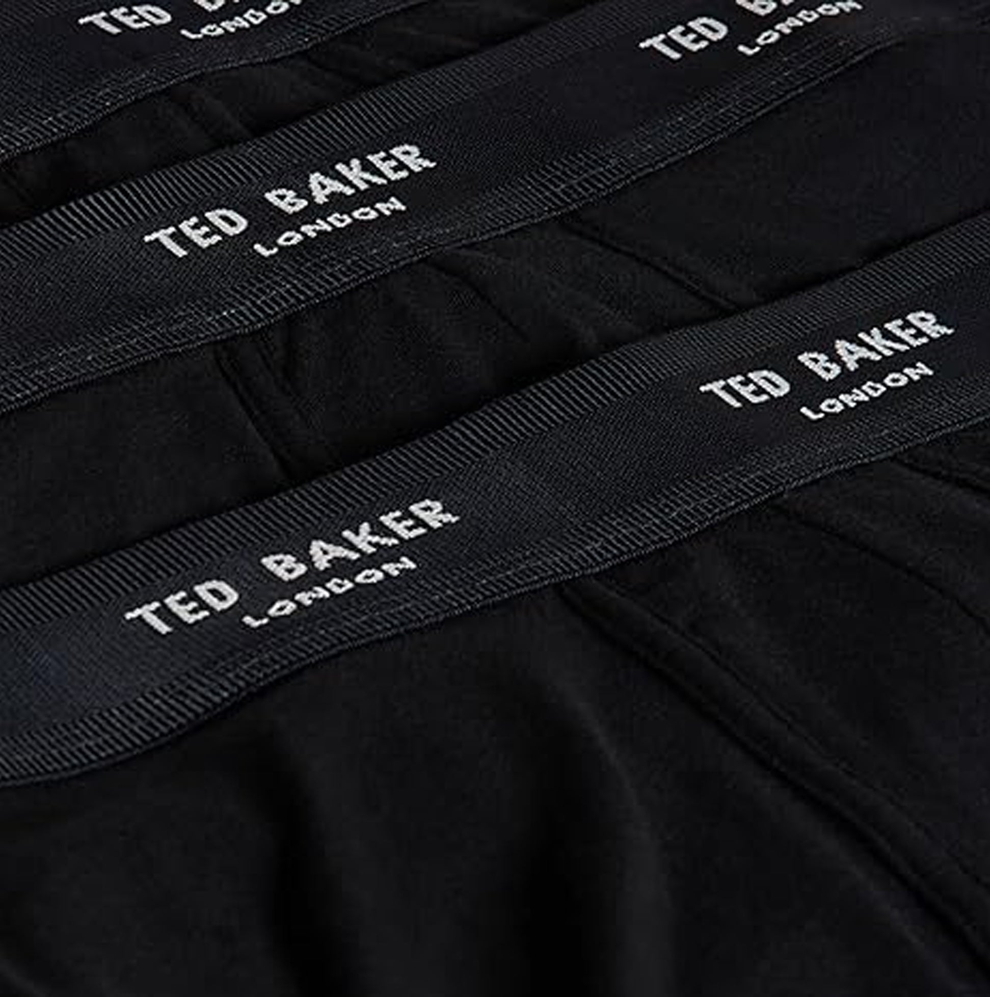 Ted Baker 3-Pack Cotton Trunks Mens Black detailed view of the elasticated waistband logos in black.
