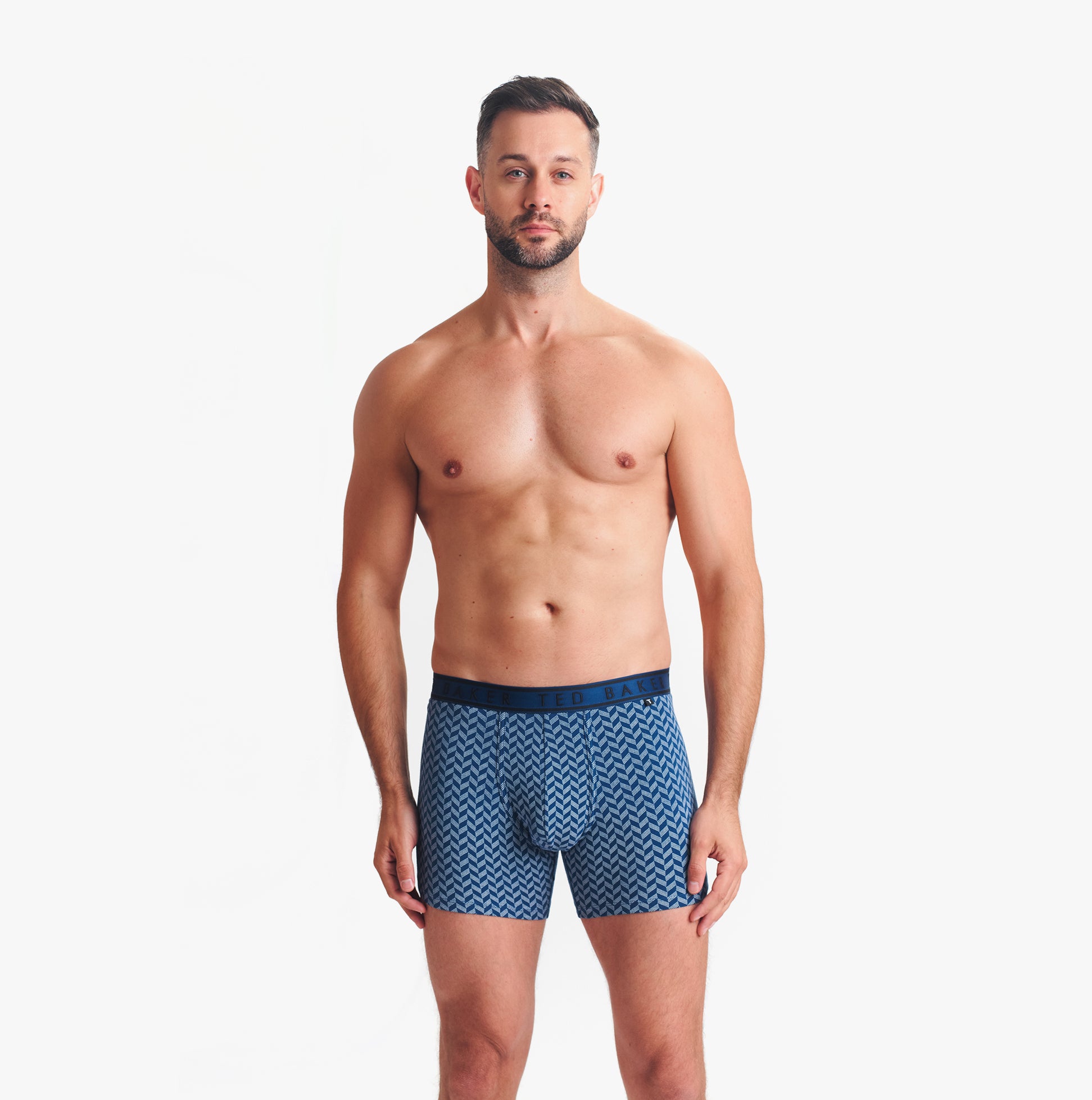 Ted Baker 3-Pack Cotton Boxer Briefs Mens Boxer Briefs Multi, front view on model wearing navy patterned briefs.