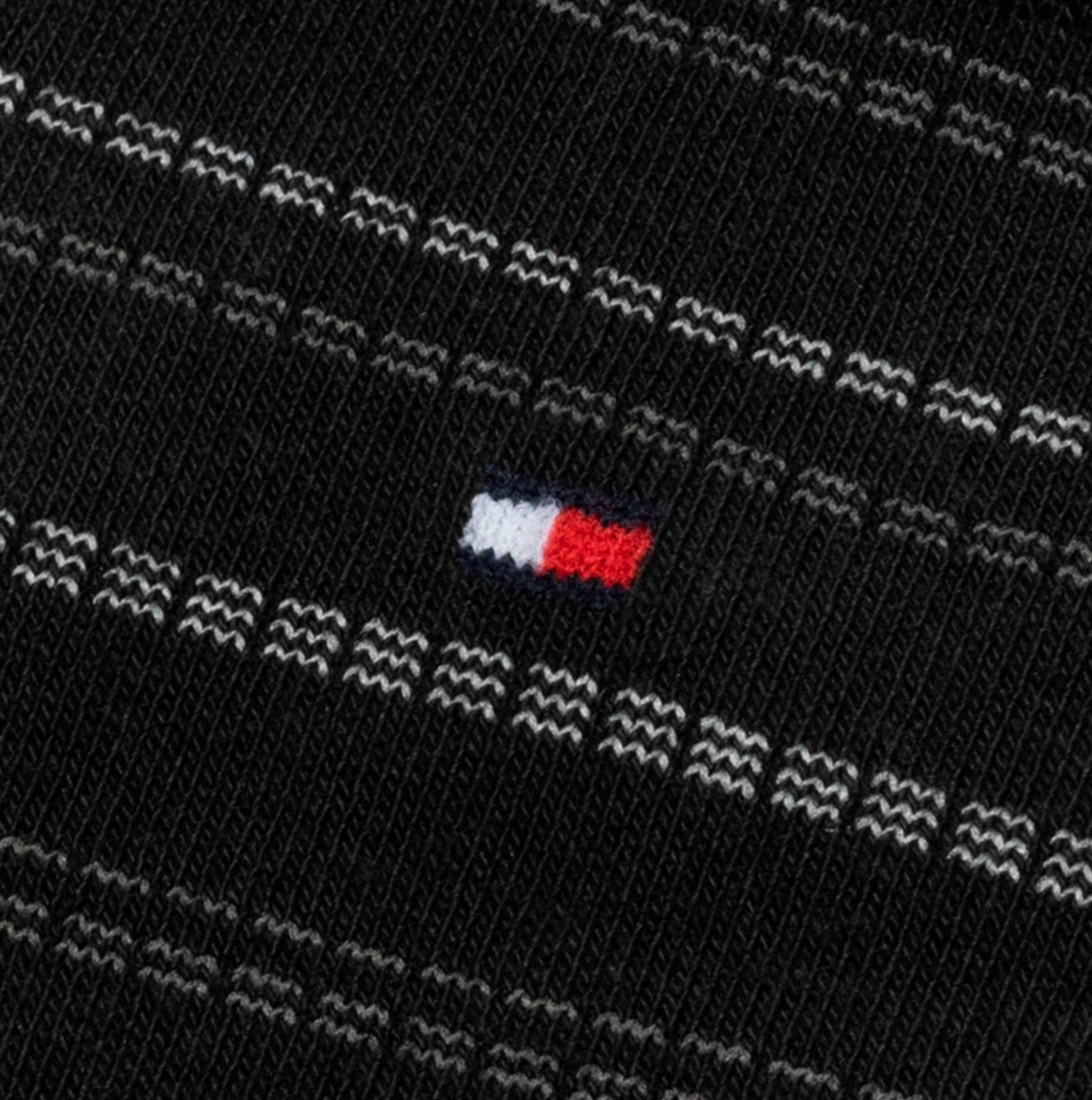 Tommy Hilfiger 4 Pack Giftboxed Classic Mens Crew Socks Black close-up view of sock design with logo detail.