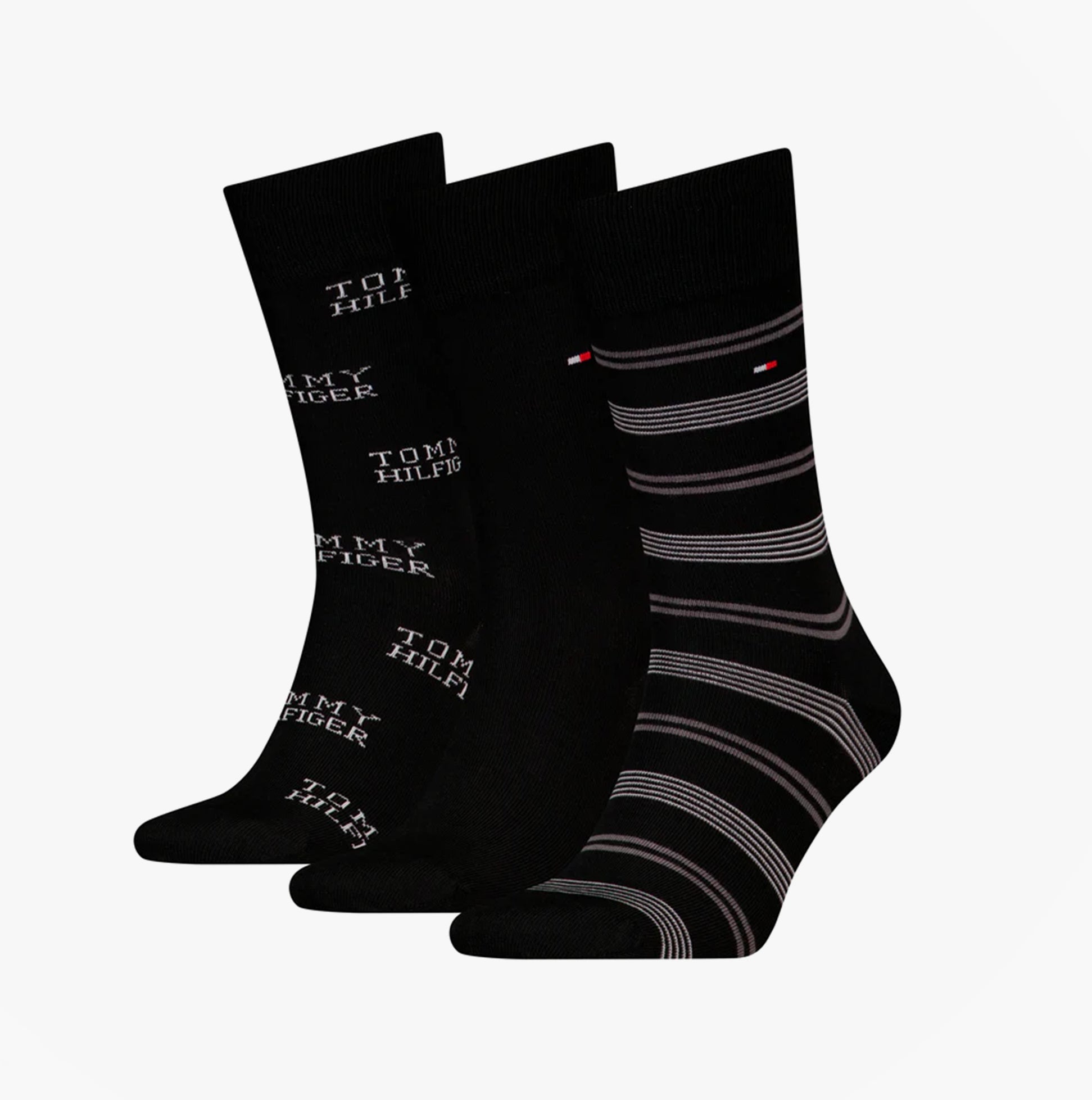 Tommy Hilfiger 3 Pack Giftboxed Classic Mens Crew Socks Black, side view showing three different sock designs.