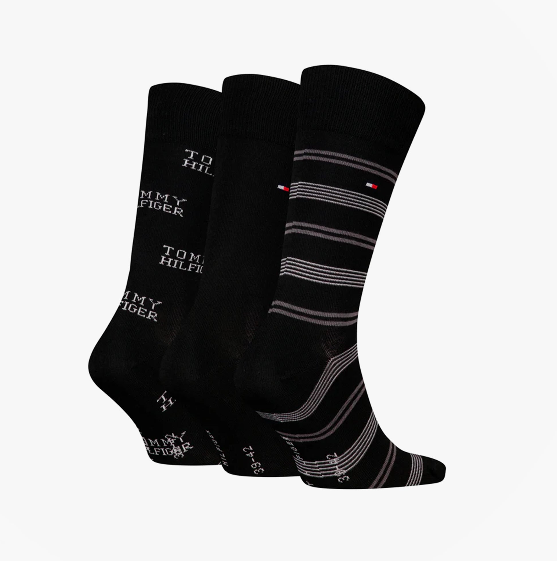 Tommy Hilfiger 3 Pack Giftboxed Classic Mens Crew Socks Black side view showcasing three different sock designs.