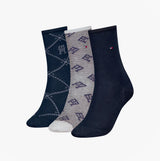 Tommy Hilfiger 3 Pack Giftboxed Monogram Womens Crew Socks Navy, side view of three different patterned socks.