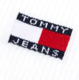 Tommy Hilfiger 2 Pack Flag Trainer Mens Crew Socks White logo close-up view with brand name detail on fabric.
