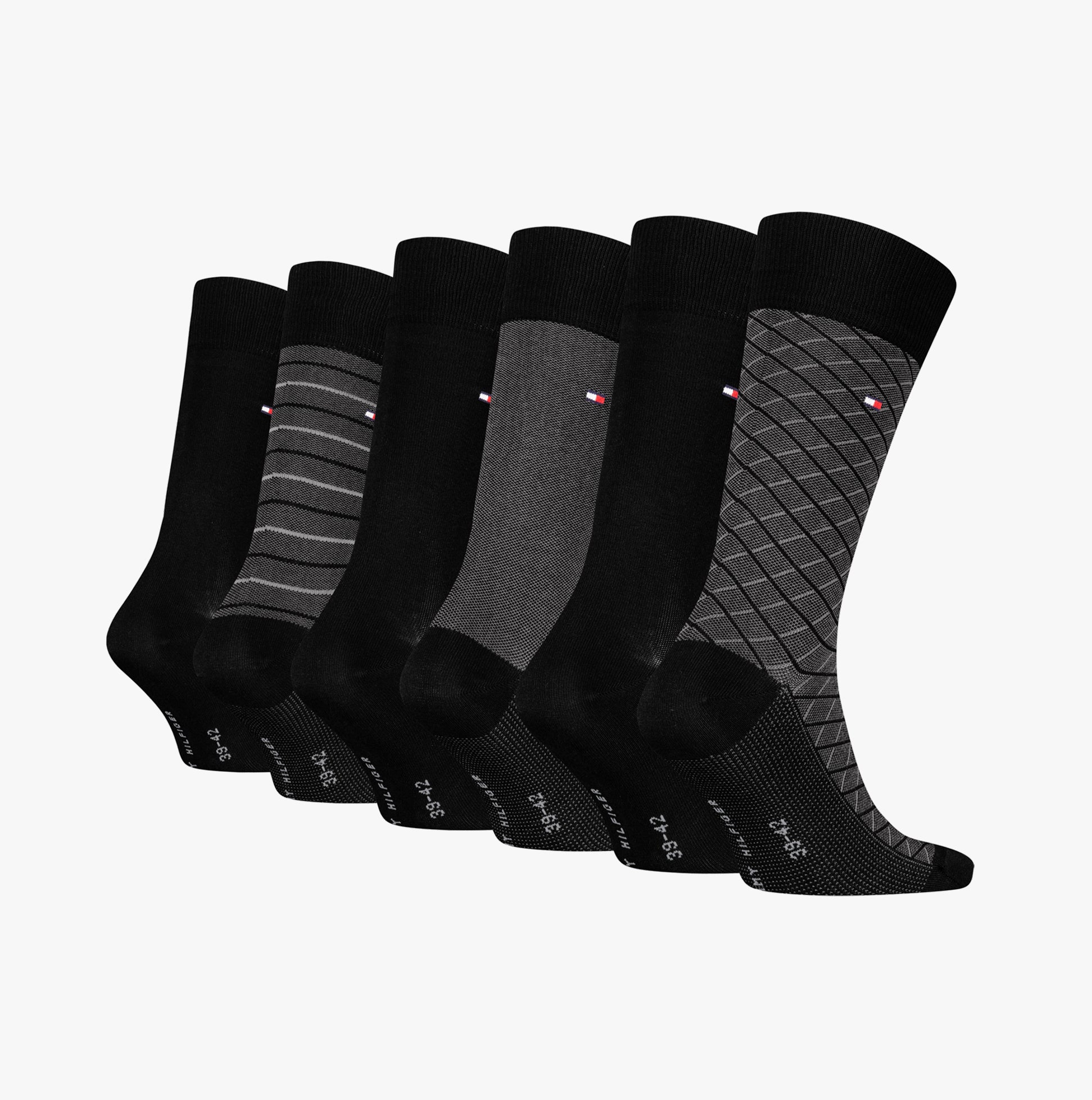 Tommy Hilfiger 6 Pack Giftbox Birdey Mens Socks Black displayed in a side view showcasing various patterns and textures in a gift box.