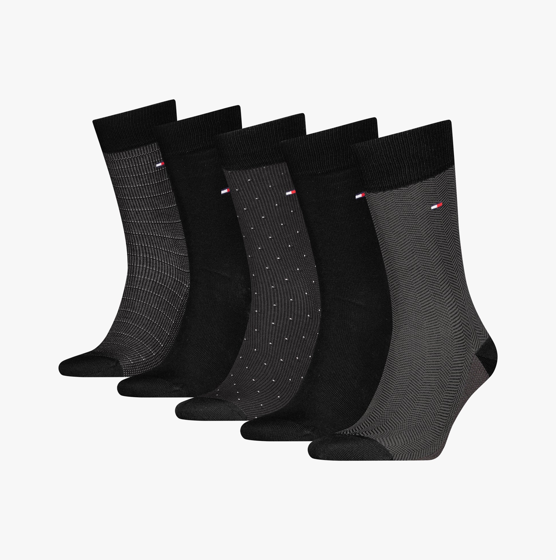 Tommy Hilfiger 5 Pack Giftbox Herringbone Mens Socks Black showing five pairs in various black designs, front view.