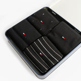 Tommy Hilfiger 4 Pack Giftbox Mens Socks Black in gift box top view showing black and striped designs.