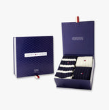 Tommy Hilfiger 3 Pack Giftbox Bootsock Mens Socks Navy in a gift box, displaying crew socks in navy and white stripes.