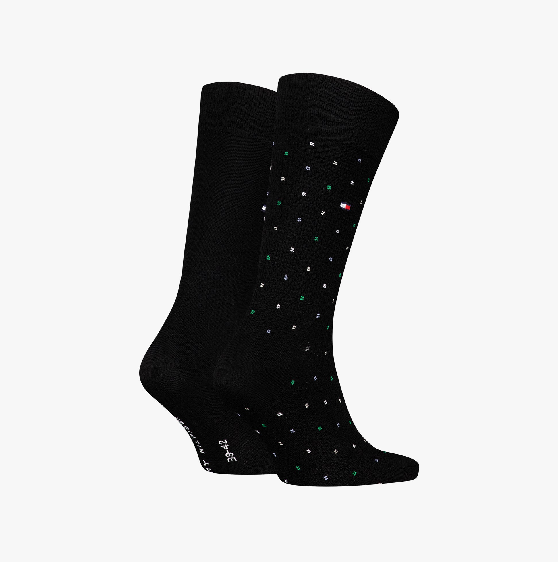 Tommy Hilfiger 2 Pack Structure Dot Mens Socks Black side view showing polka dot design and solid color.