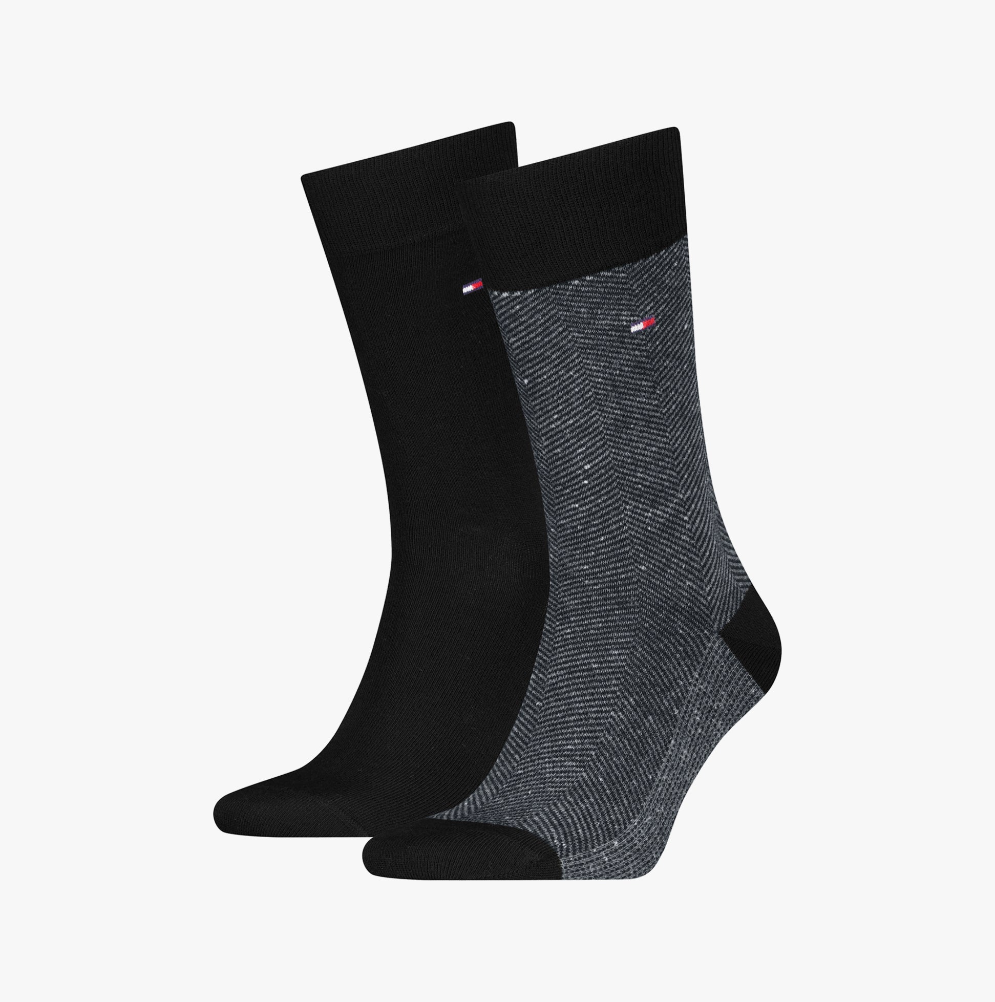 Tommy Hilfiger 2 Pack Nappy Herringbone Mens Socks Black, side view showing two styles, solid black and herringbone design.
