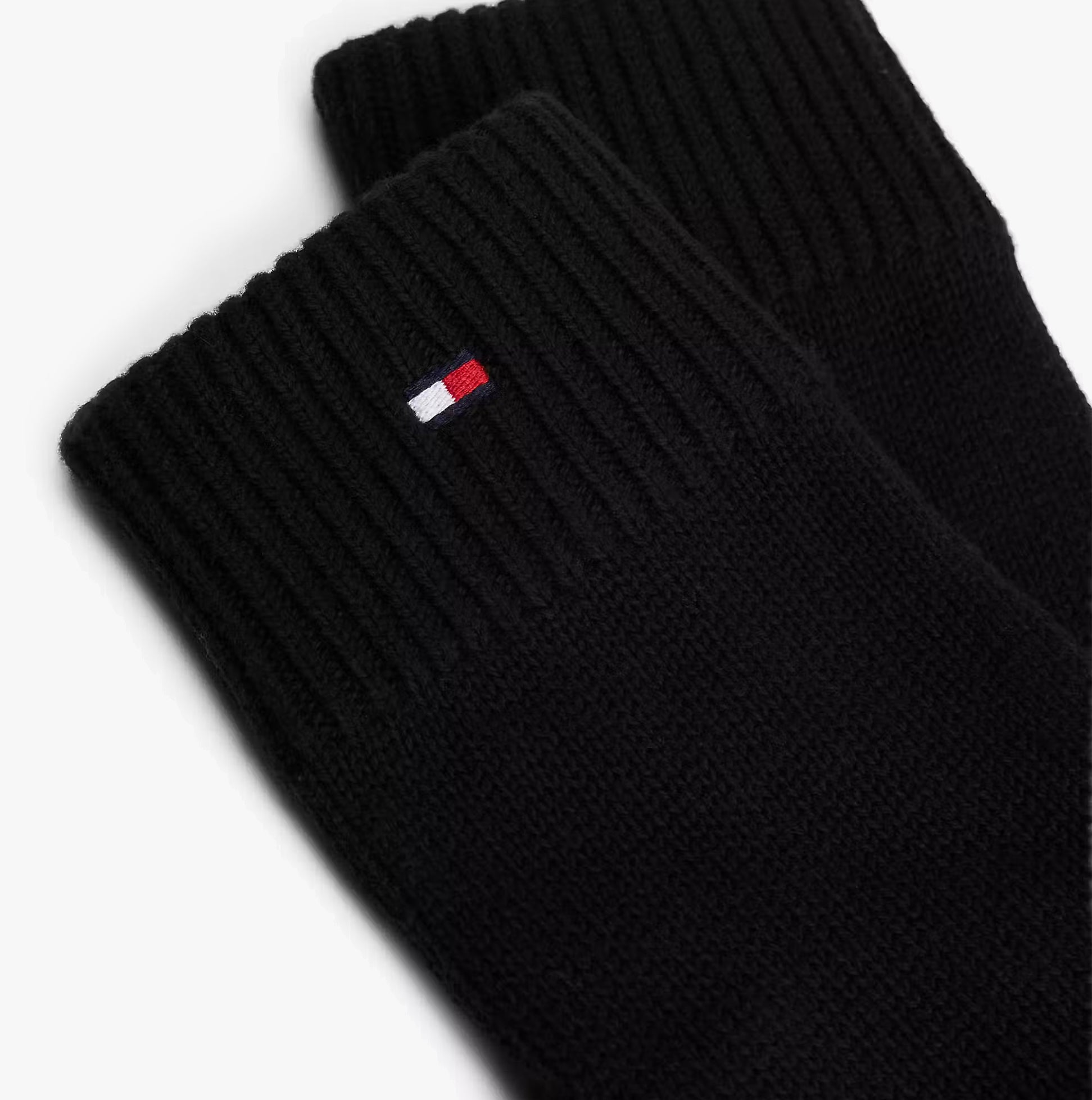 Tommy Hilfiger ESSENTIALS FLAG GLOVES Mens Gloves Black detail view featuring ribbed cuffs and logo patch.
