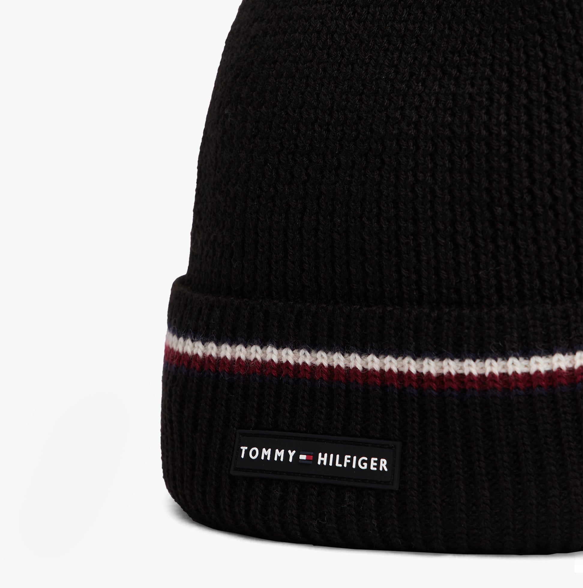 Tommy Hilfiger Signature Tape Mens Wool Beanie Black detail view showcasing brand label and striped design.