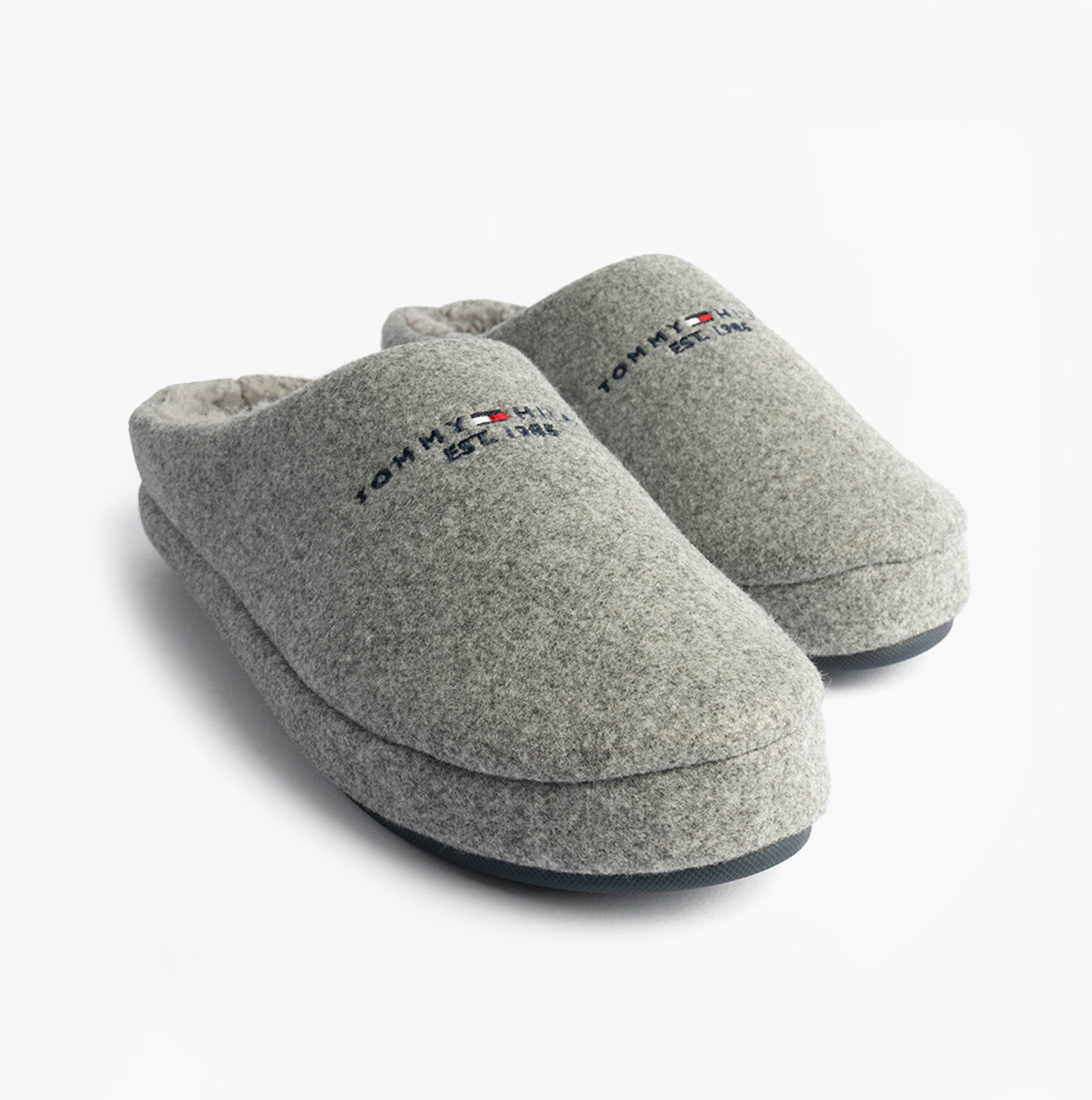 Tommy Hilfiger HILFIGER FELT HOUSE Mens House Slippers Universal Grey side view showcasing soft textile upper and slip-on design.