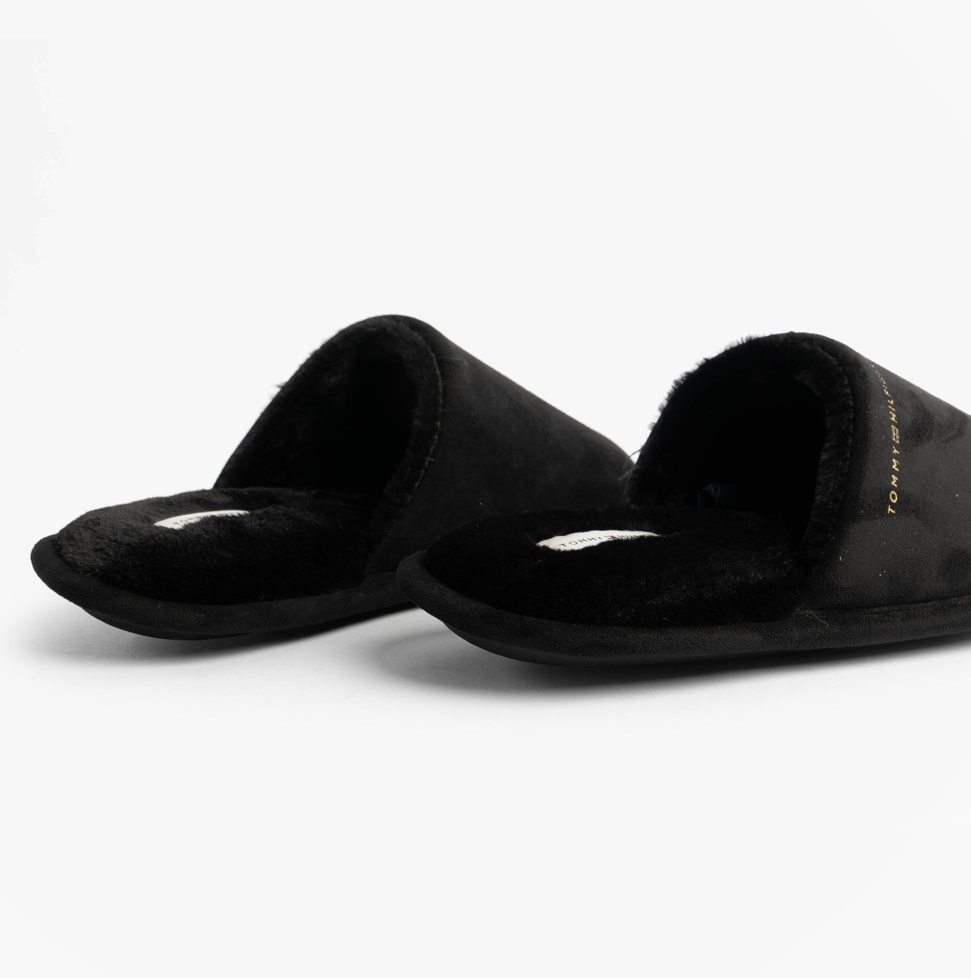 Tommy Hilfiger TH SOFT HOUSE SHOE Womens Slippers Black, side view showing soft textile mules with lightweight design.