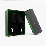 Tommy Hilfiger TH SOFT HOUSE SHOE Womens Slippers Black in gift box, side view showing slippers and packaging.