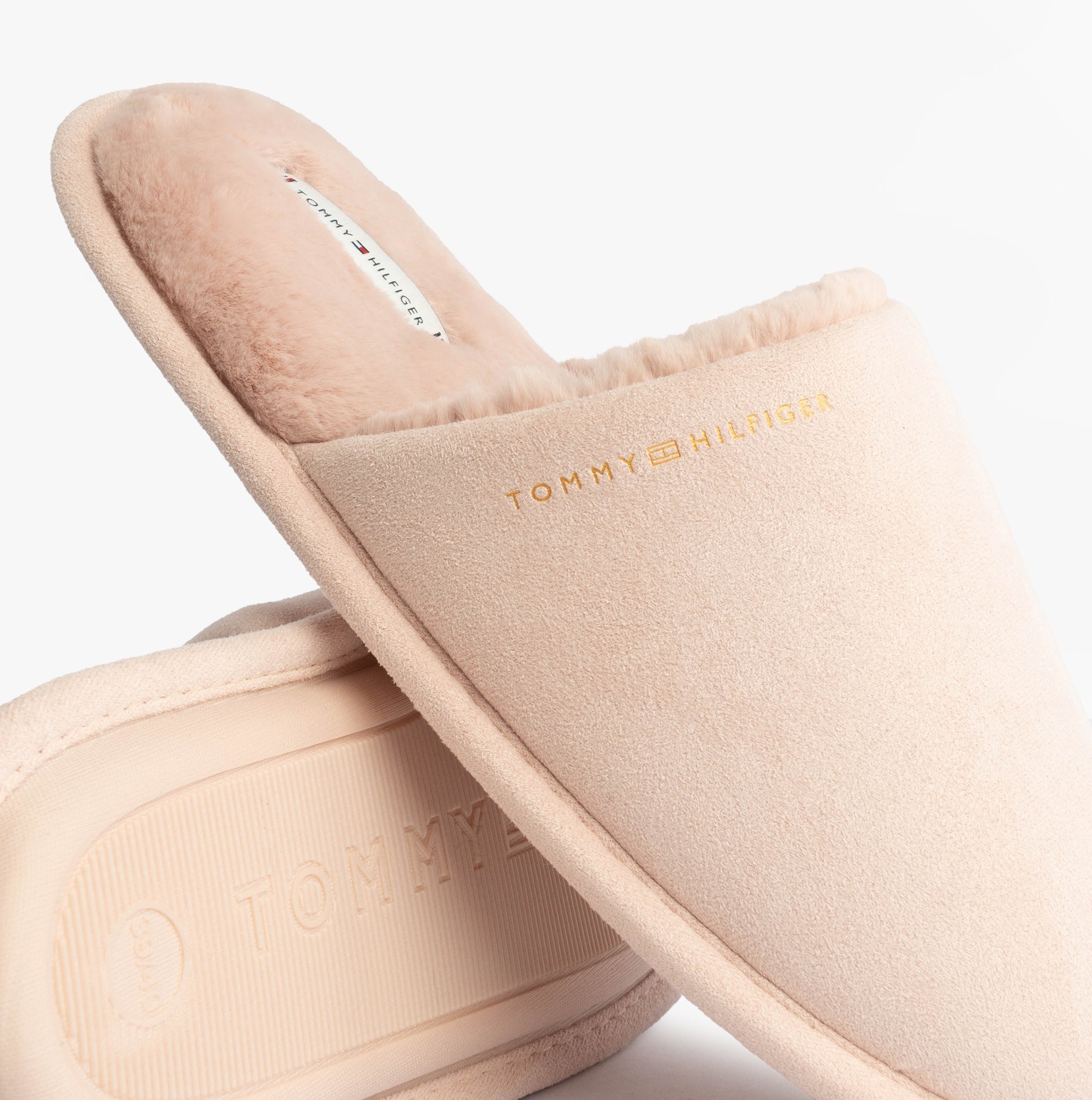 Tommy Hilfiger TH SOFT HOUSE SHOE Womens Slippers Misty Bluesh side view showing soft pink suede upper and fluffy lining.
