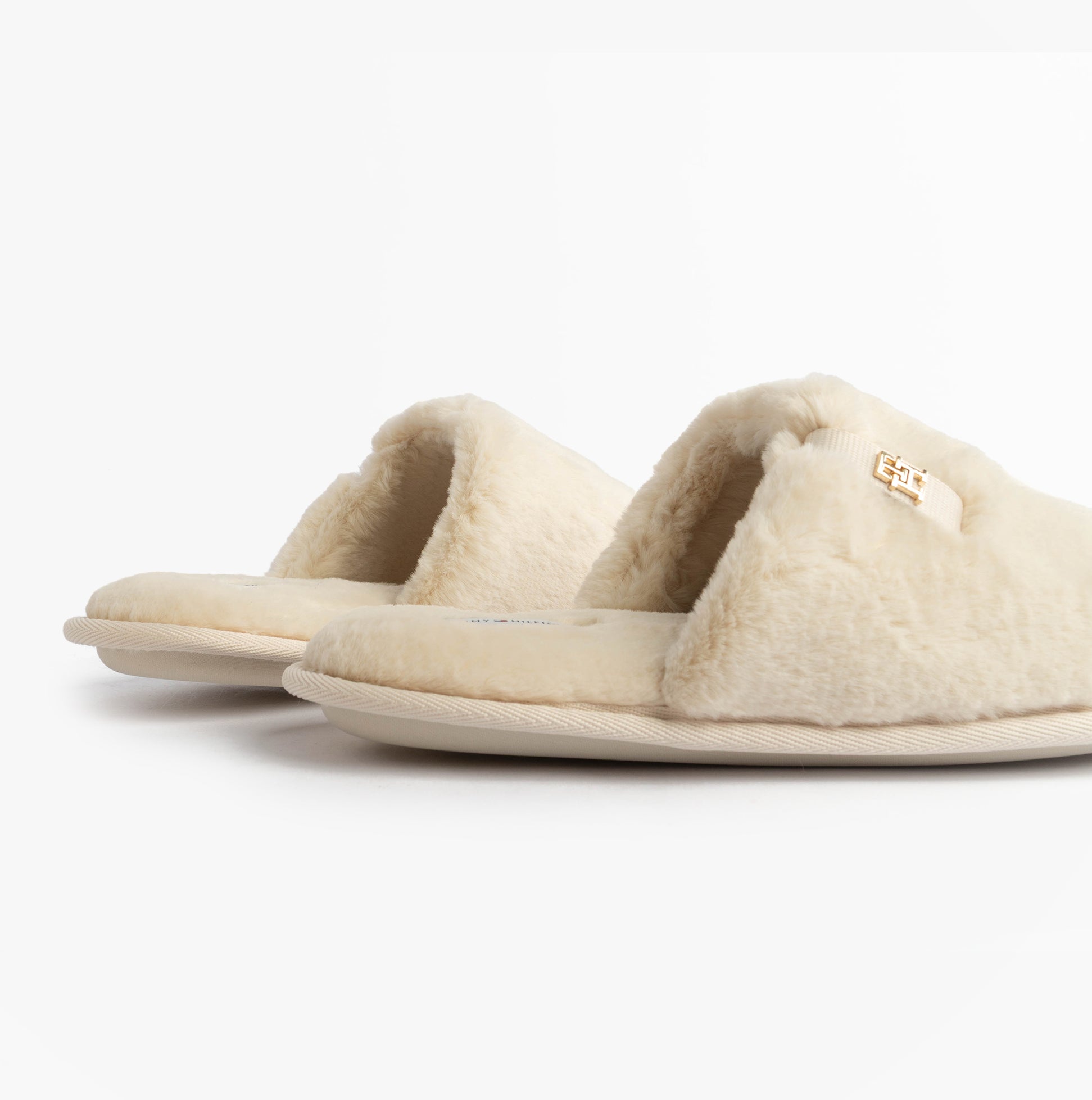 Tommy Hilfiger TH FAUX FUR HOUSE SH Womens Slippers Ancient White side view showcasing soft faux fur design.