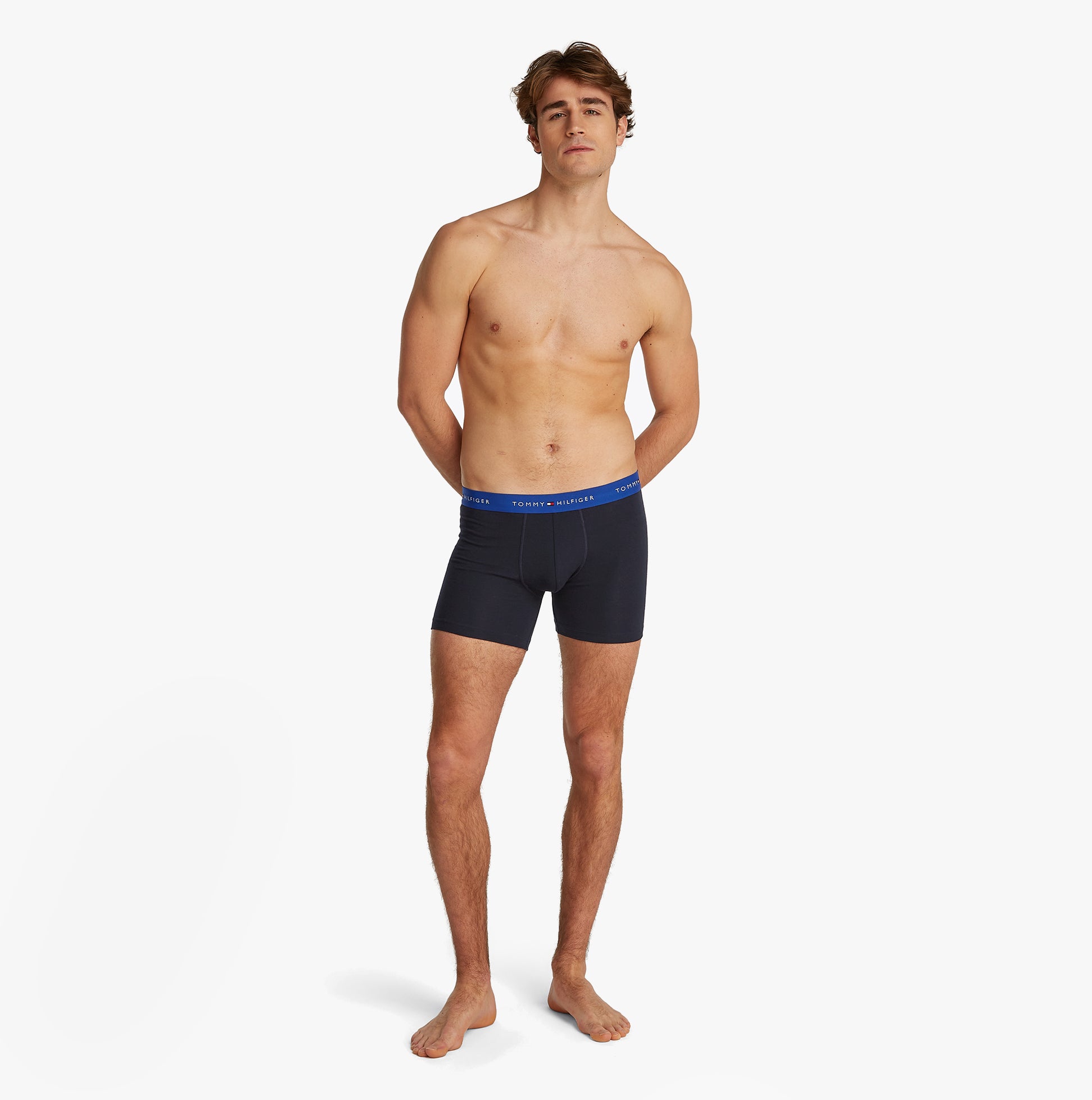Tommy Hilfiger LOGO 3 Pack Mens Boxer Briefs Multicoloured front view on male model with blue waistband.