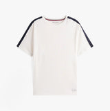 Tommy Hilfiger TH ESTABLISHED Mens T-Shirt Ecru front view showcasing short sleeves and logo tape detail on shoulders.