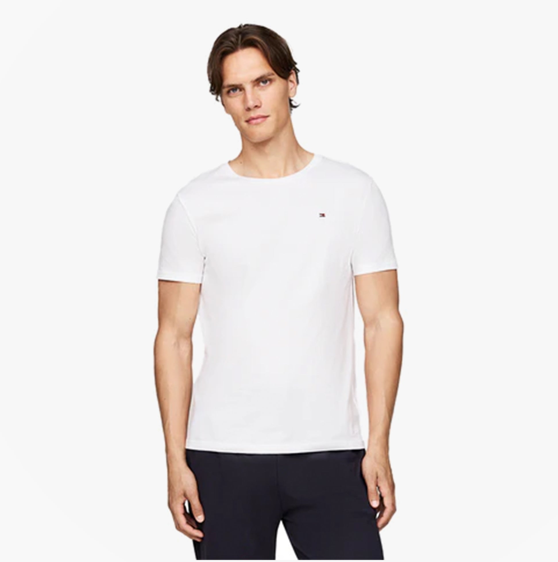 Tommy Hilfiger SIGNATURE COTTON Mens 3 Pack T Shirts Multicoloured front view of a model wearing a white t-shirt.
