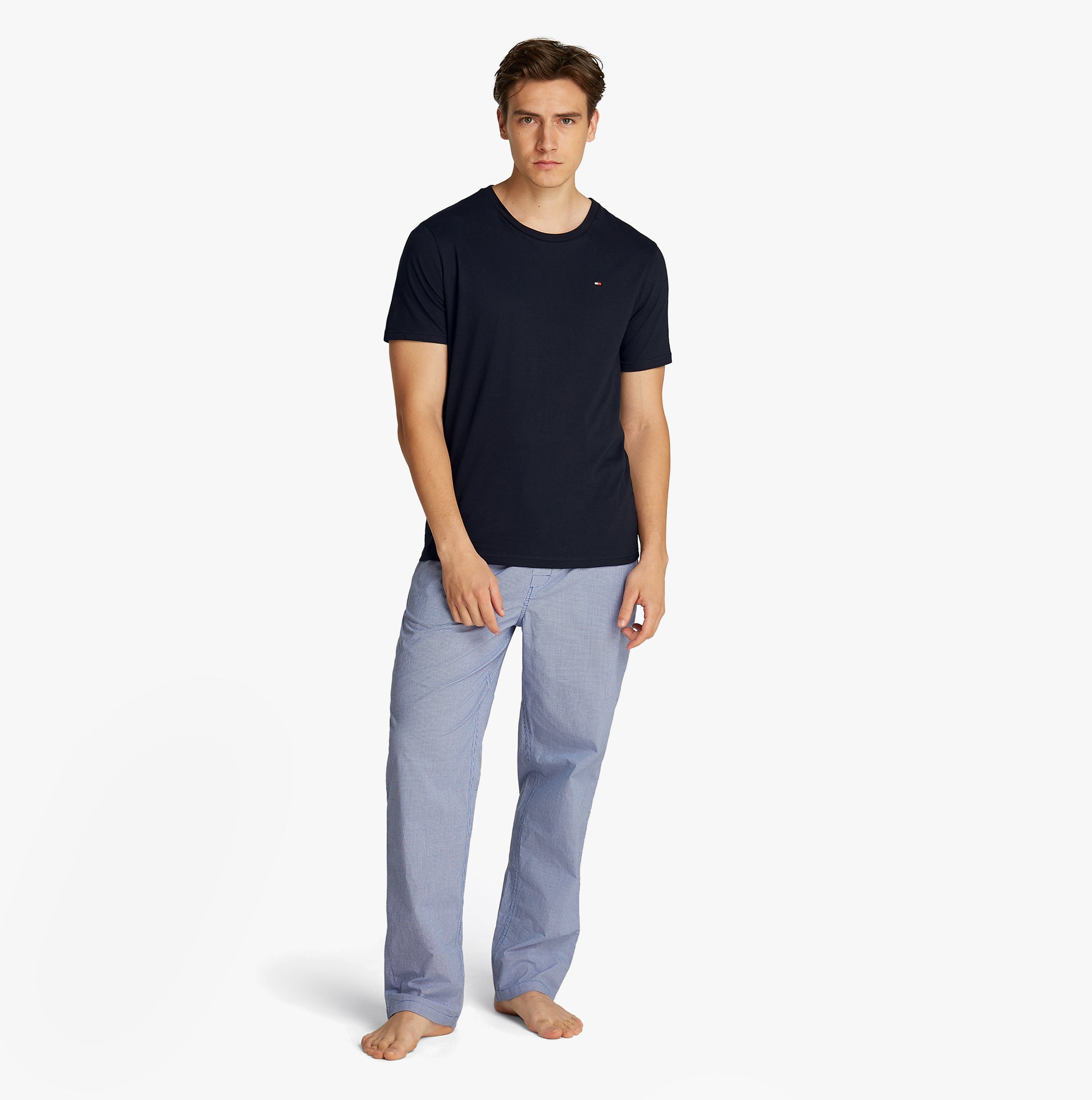 Tommy Hilfiger PURE COTTON 3 Pack Mens T-Shirts Desert Sky front view model wearing navy T-shirt and light pants