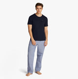 Tommy Hilfiger PURE COTTON 3 Pack Mens T-Shirts Desert Sky front view model wearing navy T-shirt and light pants