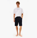 Tommy Hilfiger Mens TH Original Logo Terry Lounge Shorts Navy front view worn by model with white t-shirt.