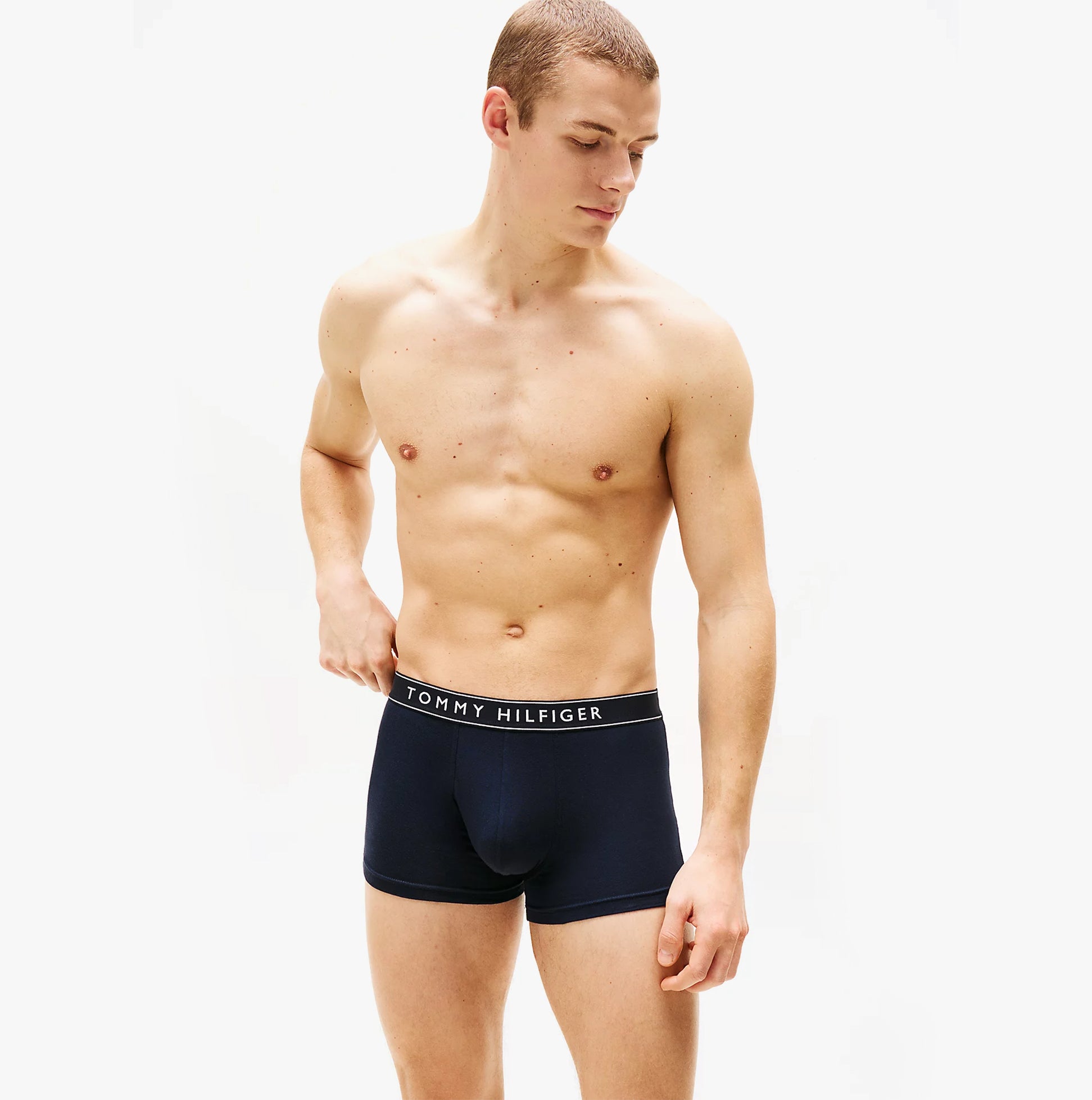 Tommy Hilfiger Mens 3 Pack Logo Waistband Trunks Navy front view on model showcasing fit and style.
