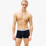 Tommy Hilfiger Mens 3 Pack Logo Waistband Trunks Navy front view on model showing logo waistband.