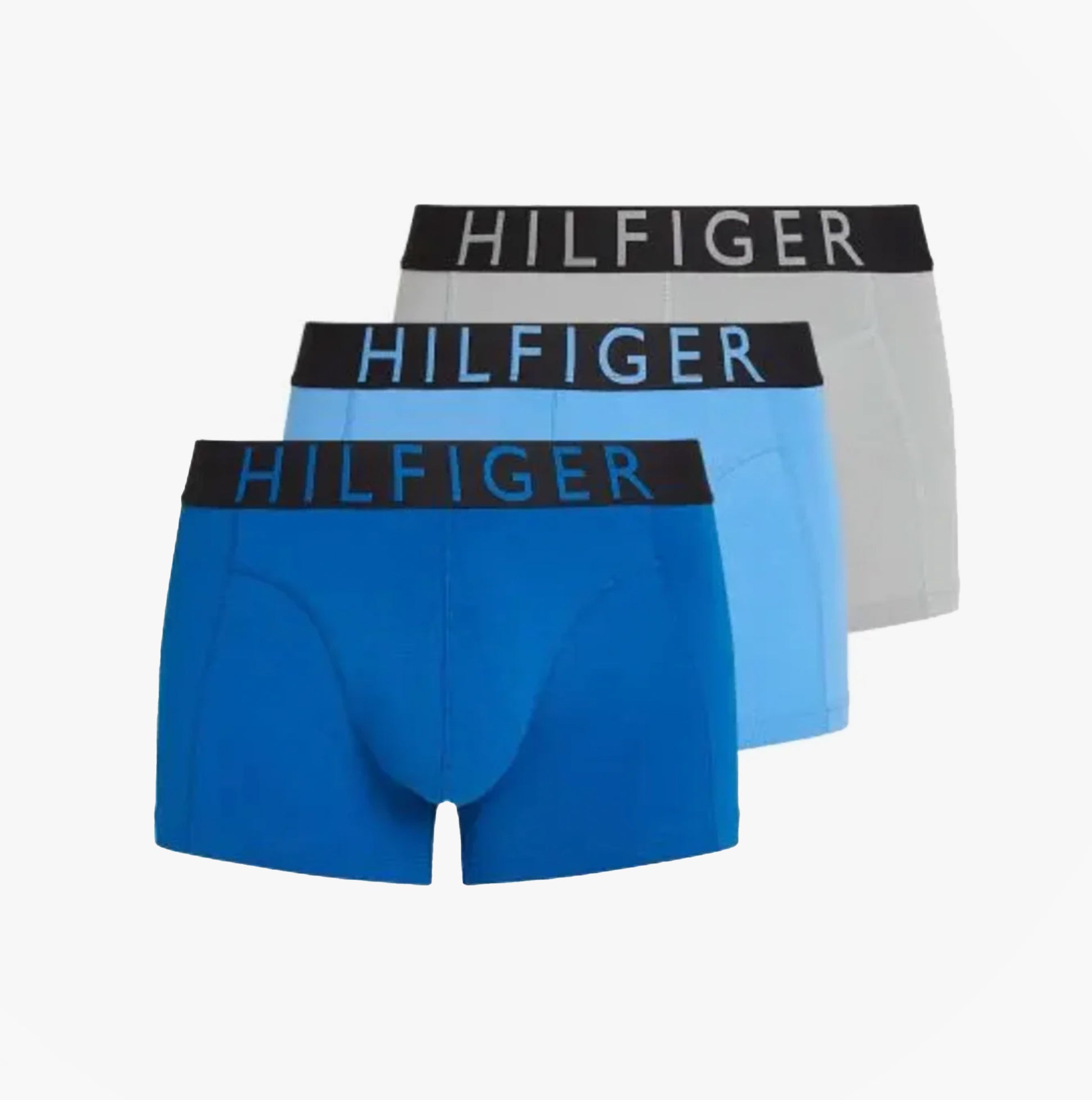Tommy Hilfiger TRUNK 3 Pack Mens Trunk Multicoloured, front view of blue, light blue, and grey trunks with logo waistband.