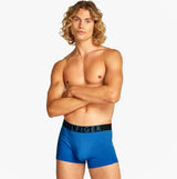 Tommy Hilfiger TRUNK 3 Pack Mens Trunk Multicoloured front view featuring blue trunk with contrasting black waistband.