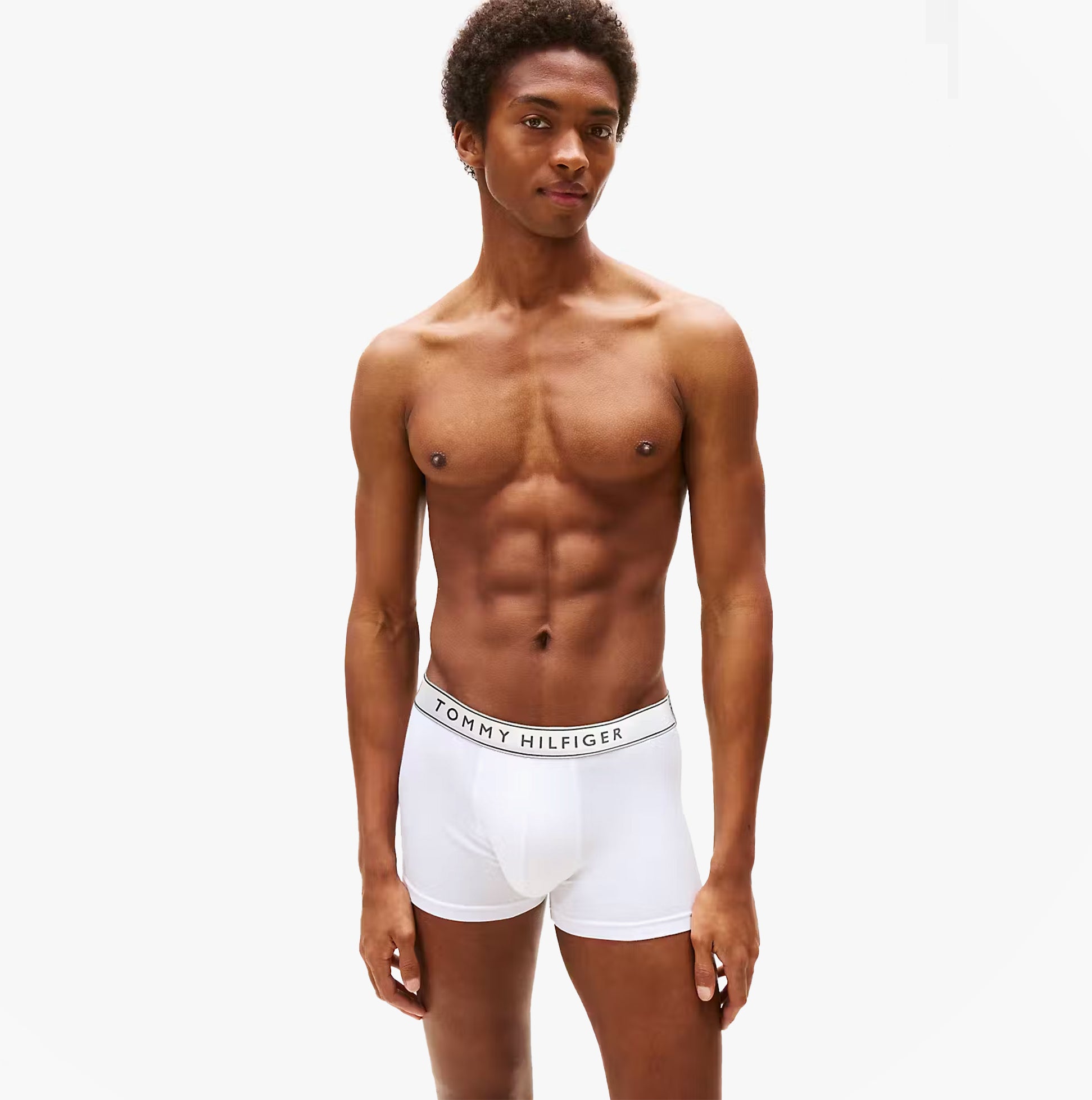Tommy Hilfiger Mens 3 Pack Trunks Grey/Black/White front view model wearing white trunks