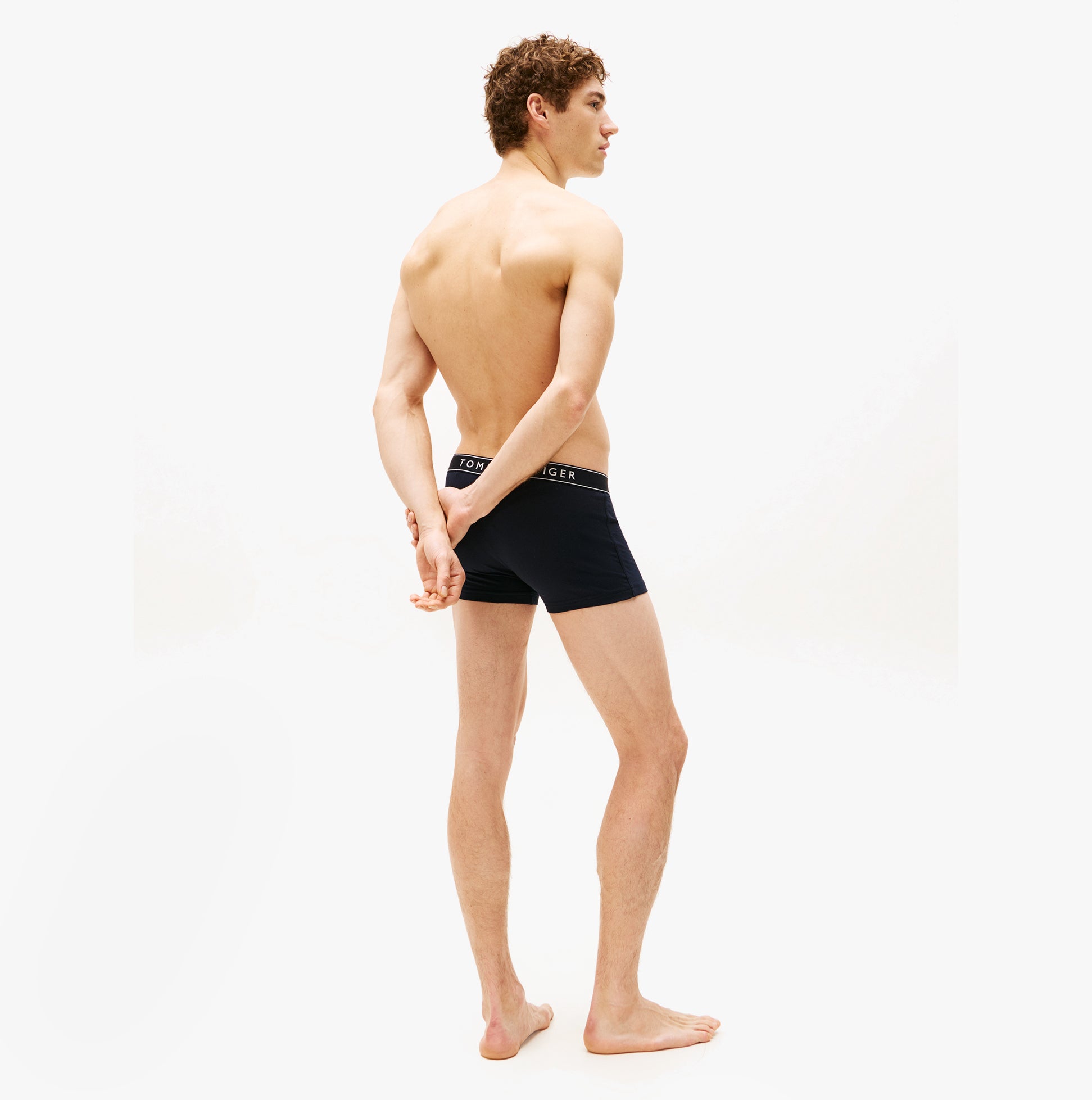 Tommy Hilfiger 3 Pack Mens Trunks Des Sky/Calico/Fssl Blue side view model wearing trunks