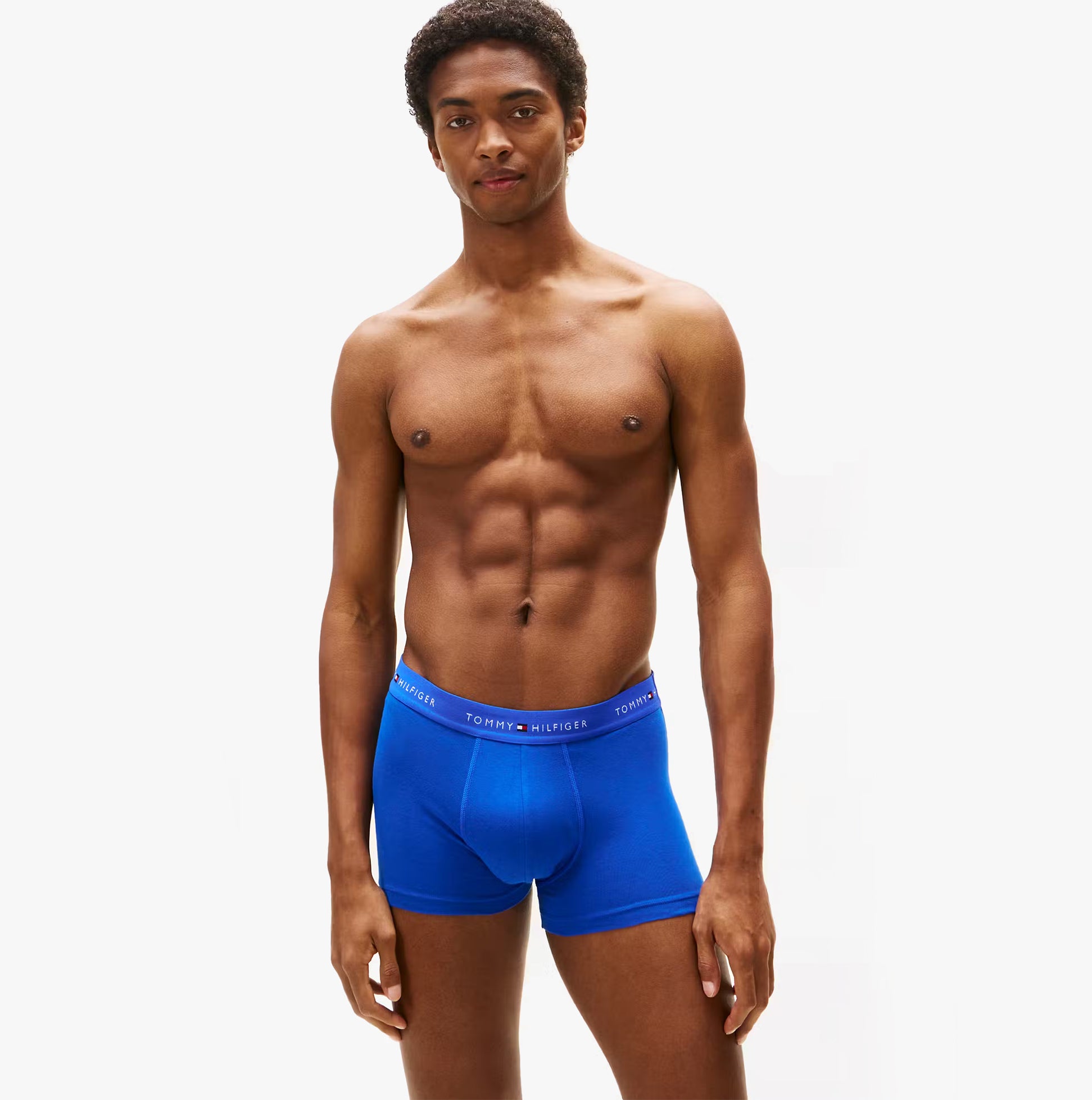 Tommy Hilfiger Mens 3 Pack Logo Waistband Cotton Trunks Multi front view, showing blue trunk with logo waistband.