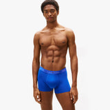 Tommy Hilfiger Mens 3 Pack Logo Waistband Cotton Trunks Multi front view, showing blue trunk with logo waistband.