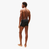 Tommy Hilfiger Mens 3 Pack Signature Microfibre Trunks Black, back view on model, showcasing fit and design.