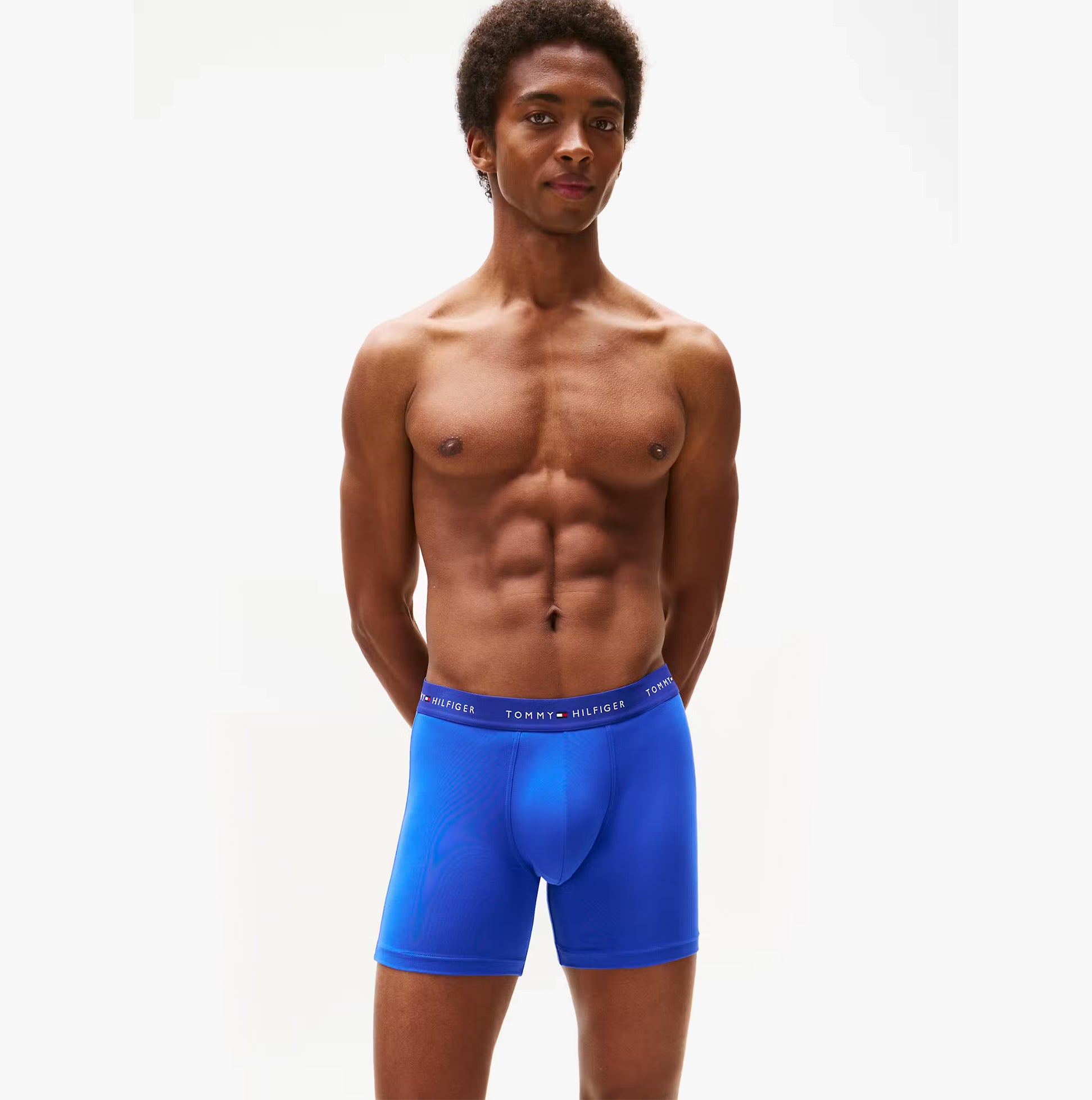Tommy Hilfiger Mens Signature Microfibre 3 Pack Boxer Briefs Blue Multi front view on model showing fit and design.