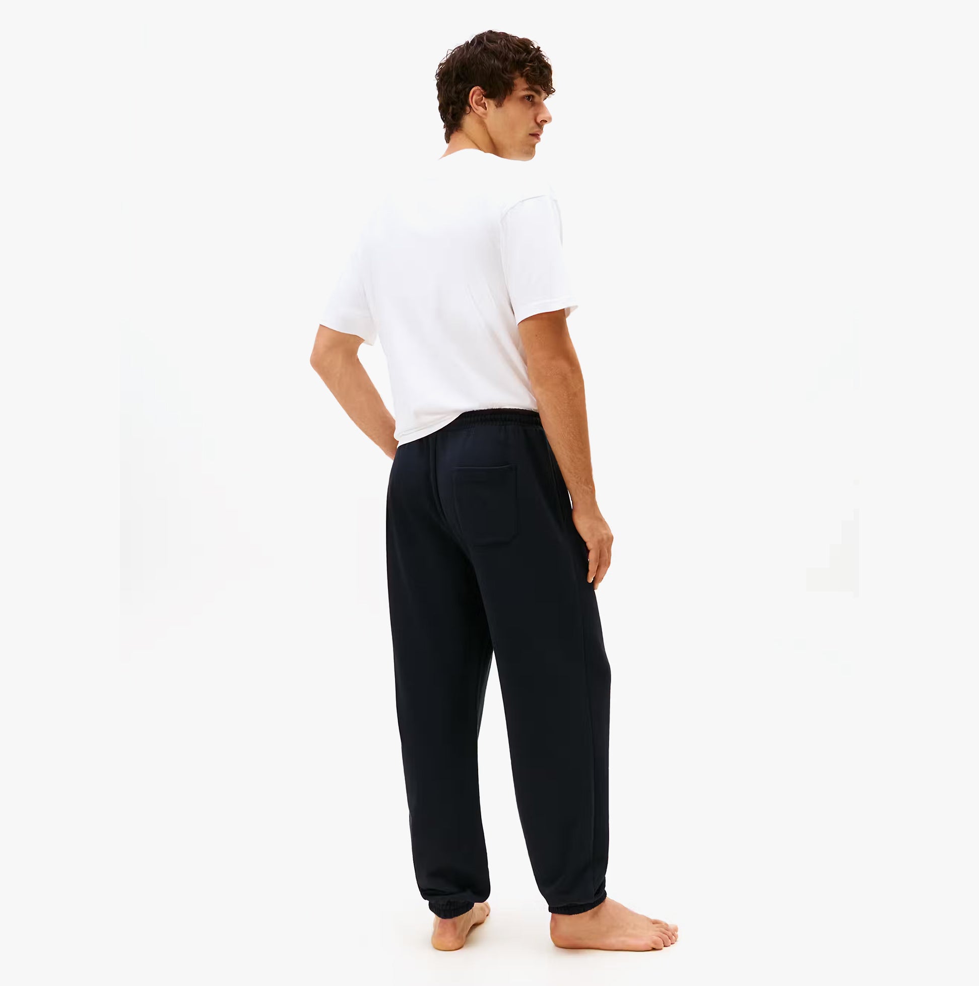 Tommy Hilfiger TRACK PANT Mens Desert Sky back view, showcasing regular fit and sustainable material.