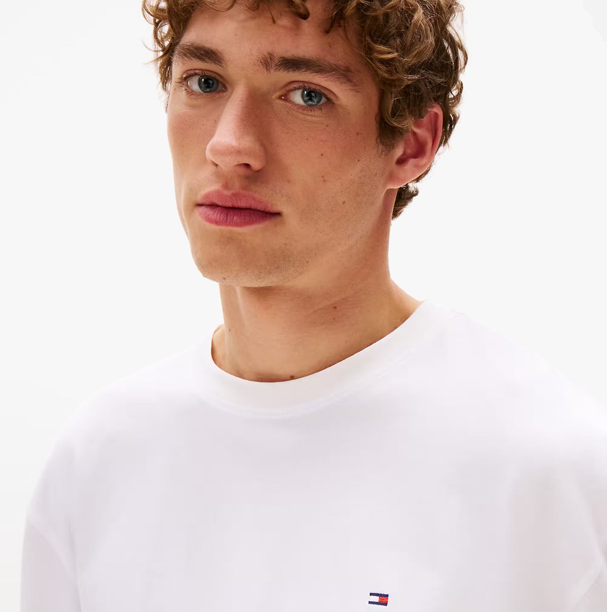 Tommy Hilfiger WOVEN PJ SET PRINT Mens Set Multicoloured front view, showing model wearing white top with logo.