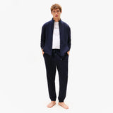 Tommy Hilfiger TH Original Mens Logo Lounge Joggers Desert Sky front view model wearing joggers with zip jacket.